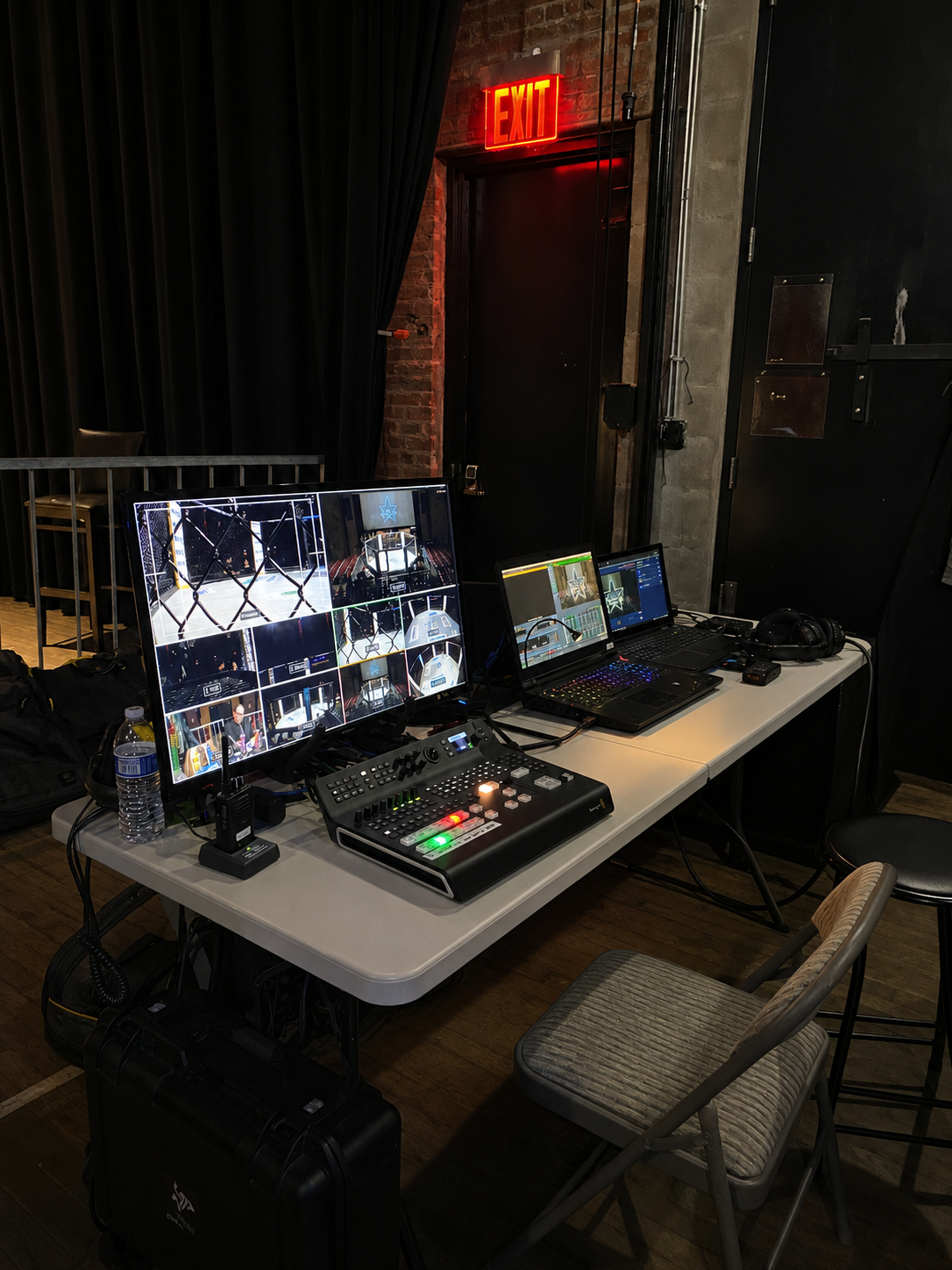 Vertical behind-the-scenes control-room view.
